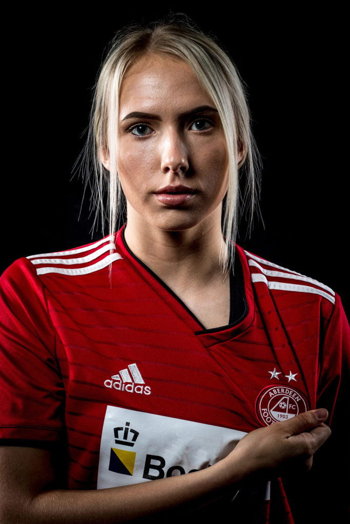 Aberdeen FC women player poses for a studio photograph for an advertising feature for the Aberdeen FC women player of the year awards poster.