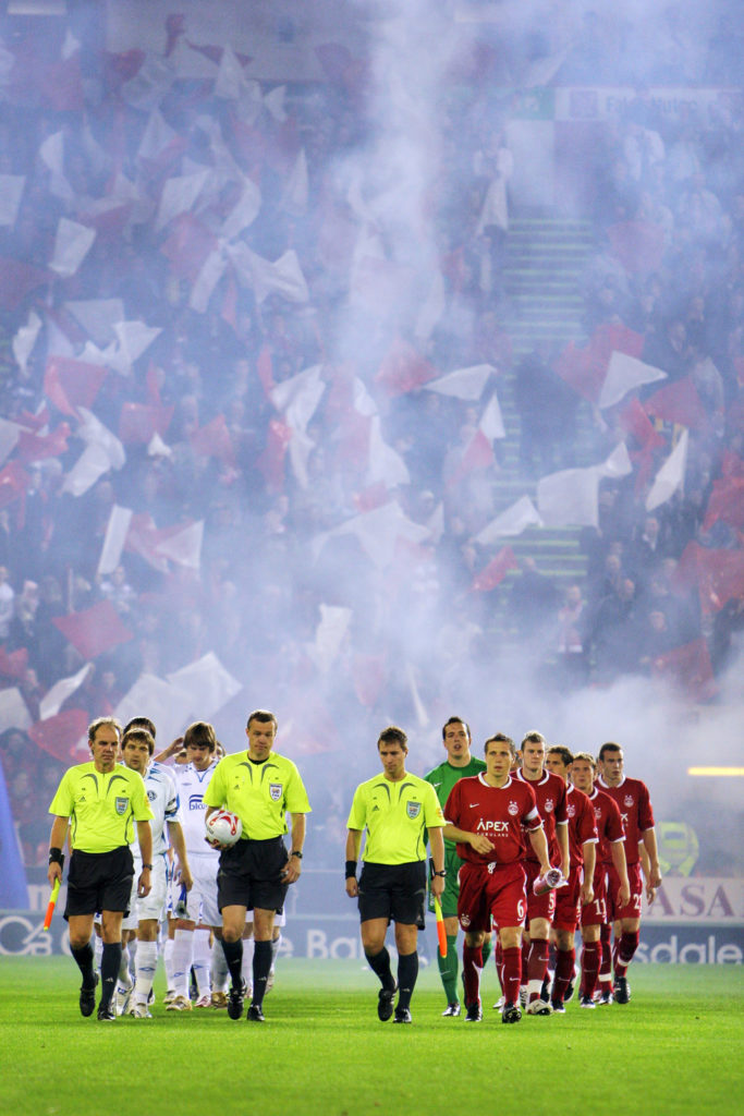 Sports Photography - Players walk out onto the pitch at pittodrie Stadium